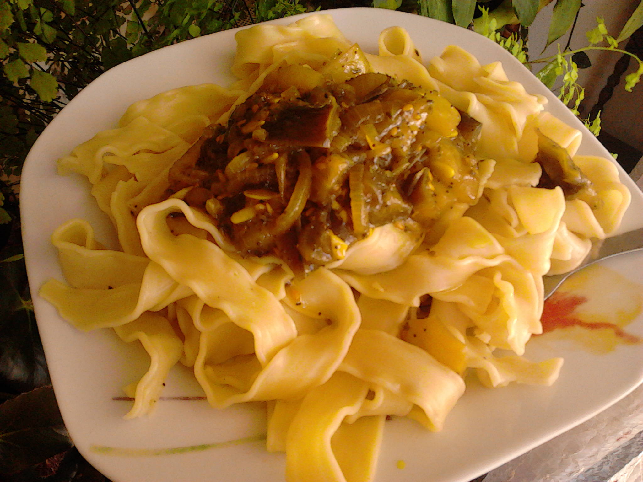 Tagliatelle with vegetables on the plate