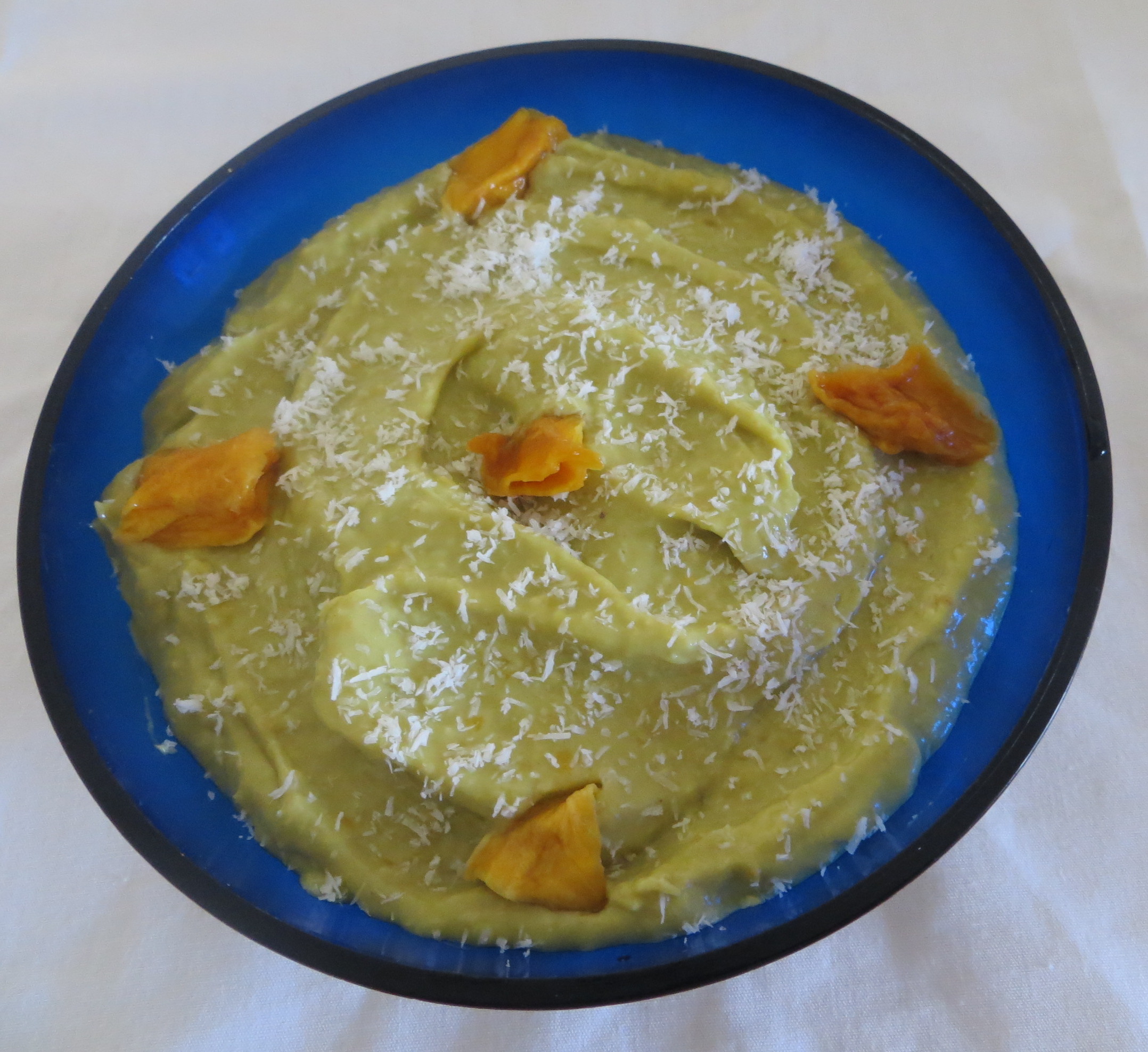 A bowl with tropical mousse